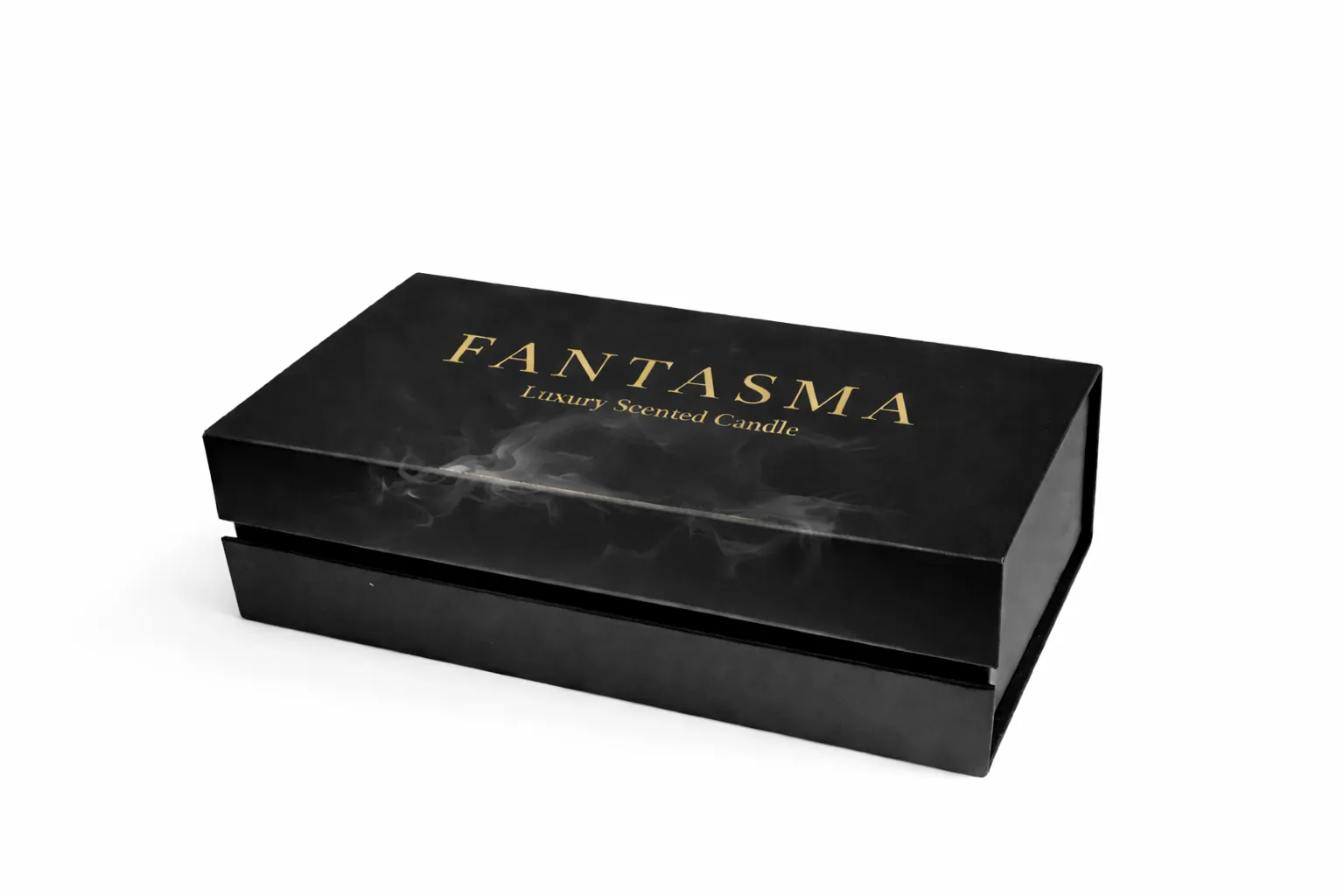 FANTASMA luxury scented candle gift box closed with gold logo on black packaging