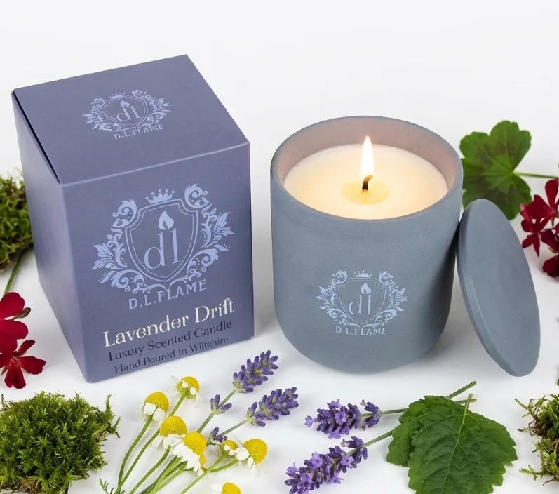 Close-up of the elegant dusty blue ceramic jar and premium gift box for the LAVENDER DRIFT candle.