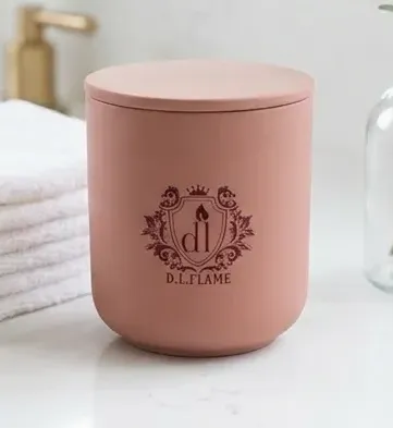 Close-up of a SPICED ROSE candle showing the elegant ceramic texture and pink lid.