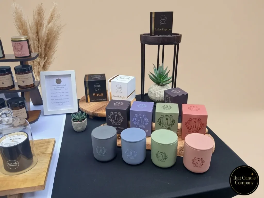 Luxury fragrance candle display featuring Spanish Nights, Snug and D.L. Flame ceramic candles from That Candle Company, showcasing premium home fragrance and handcrafted scented candles.